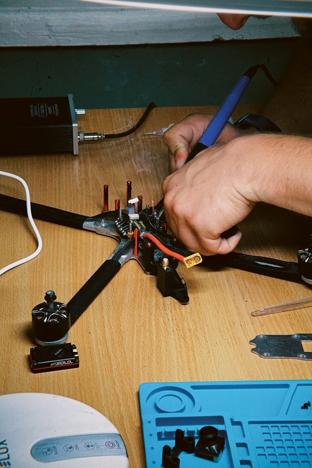 Drone being repaired on a workbench